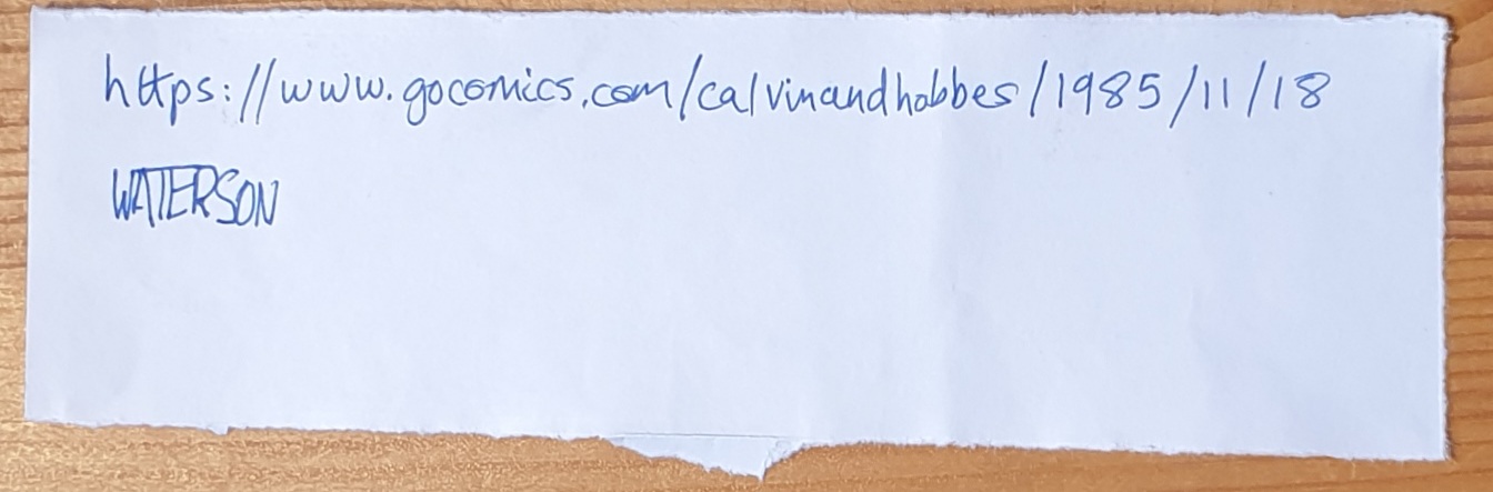 photo of paper with handwritten URL on it